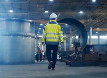 Kiwa inspector conducting Safety Culture Ladder certification audit in a factory