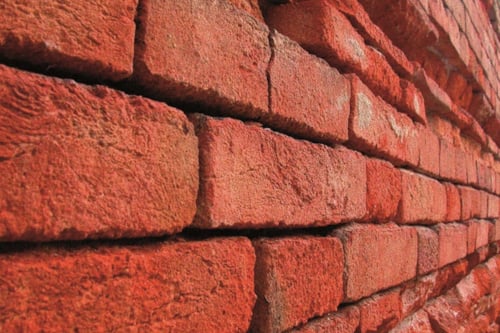 Close-up of a masonry brick wall