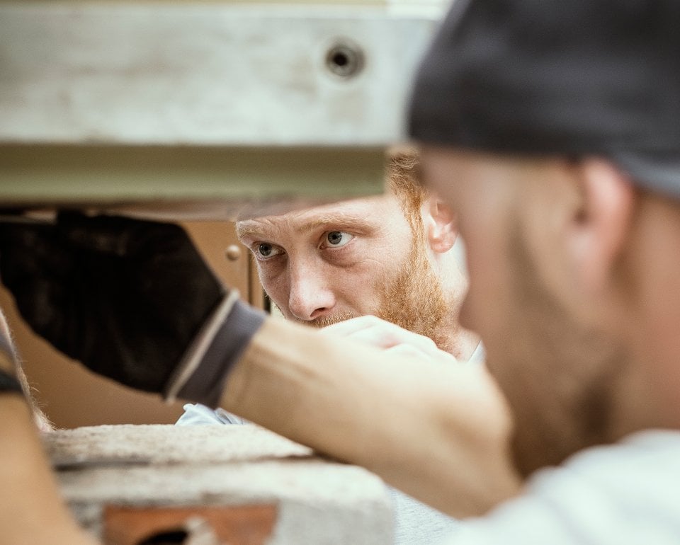 Two employees doing a rotation machinery condition assessment 