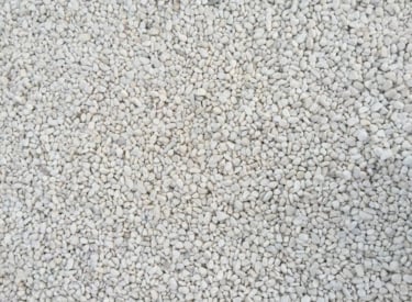 Close-up of white gravel, also mineral aggregrates in construction