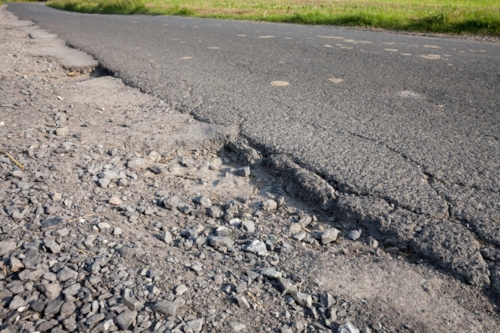 Afgebrokkeld asfalt
