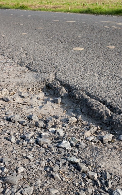 Afgebrokkeld asfalt