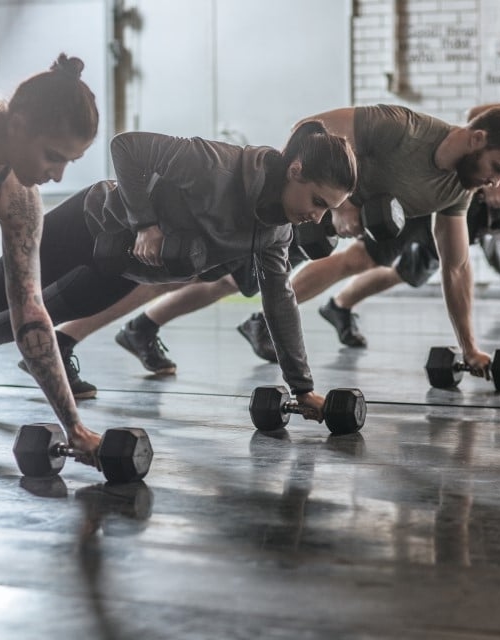 Men and women doing sports