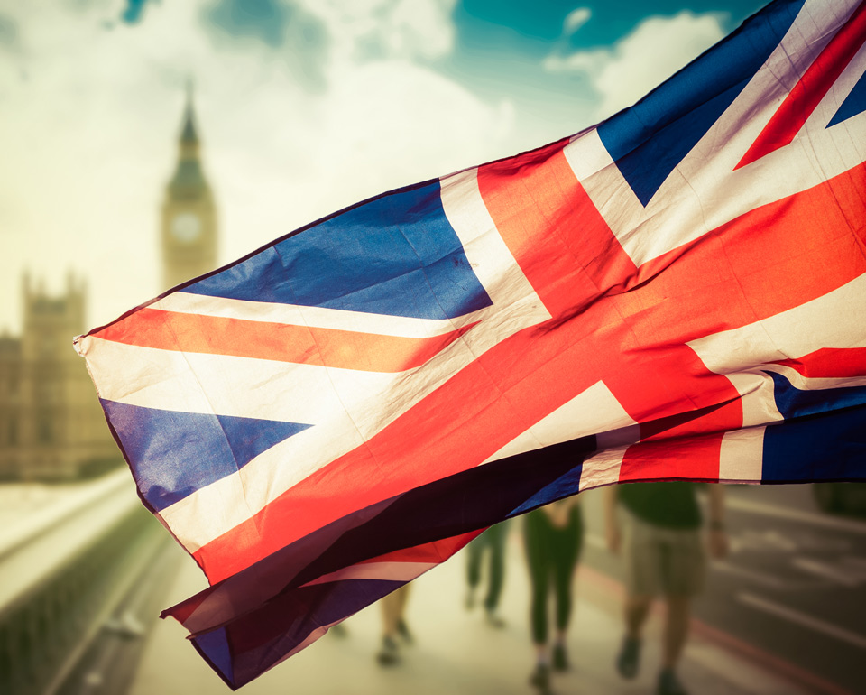 close-up of the English flag with the Big Ben in the background