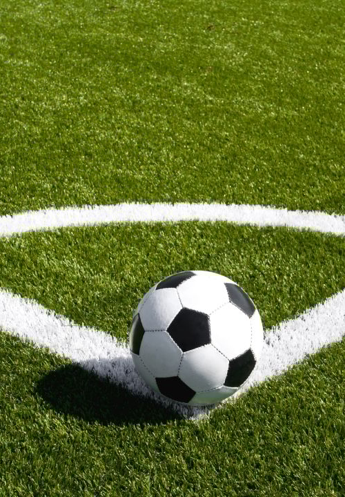 Voetbal op voetbalveld