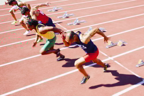 Runners on running track
