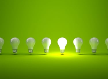 Verschillende lichtbollen waarvan er één verlicht is