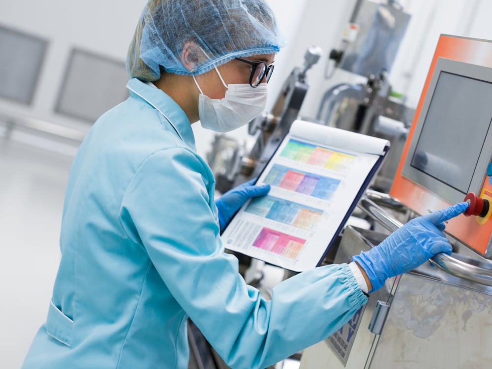 ASI Food Safety auditor performing checks during her audit